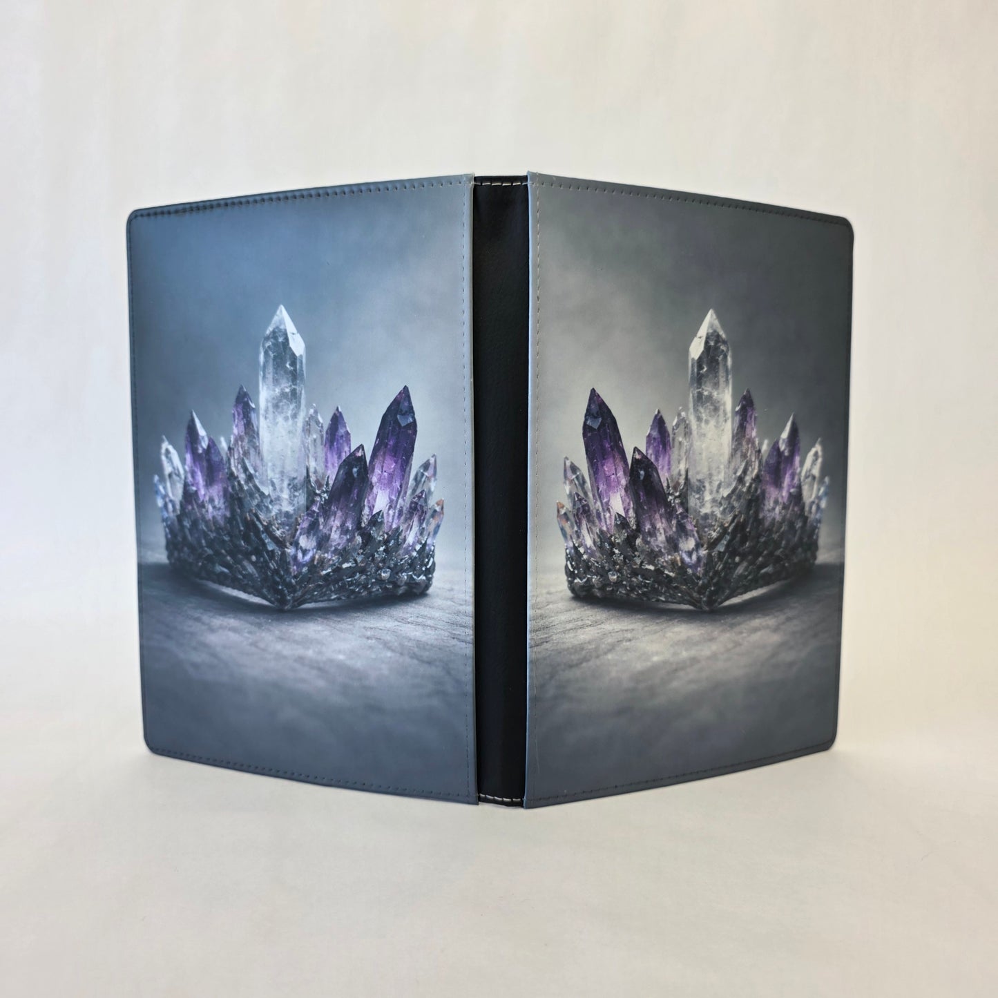 Journal cover with a crown design featuring clear and purple crystals on front and back cover.