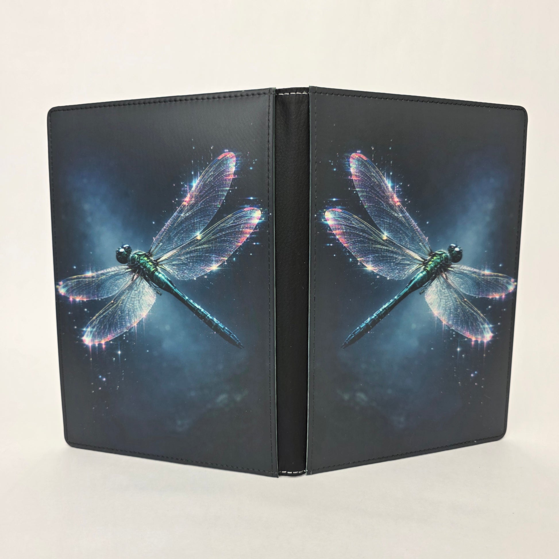 Faux leather journal with dragonfly image on front and back, with a white background.