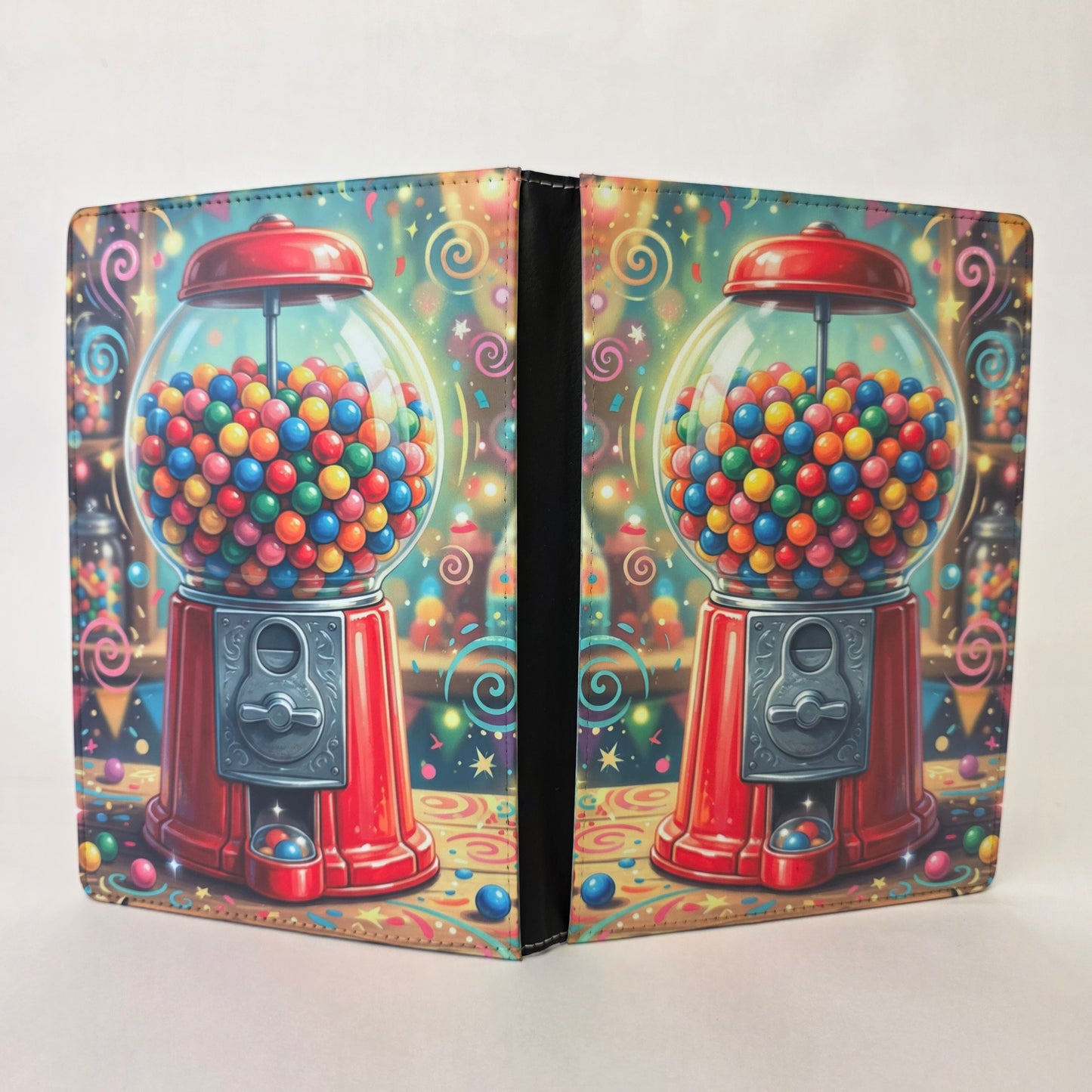 Notebook cover with a colorful gumball machine design on a white background