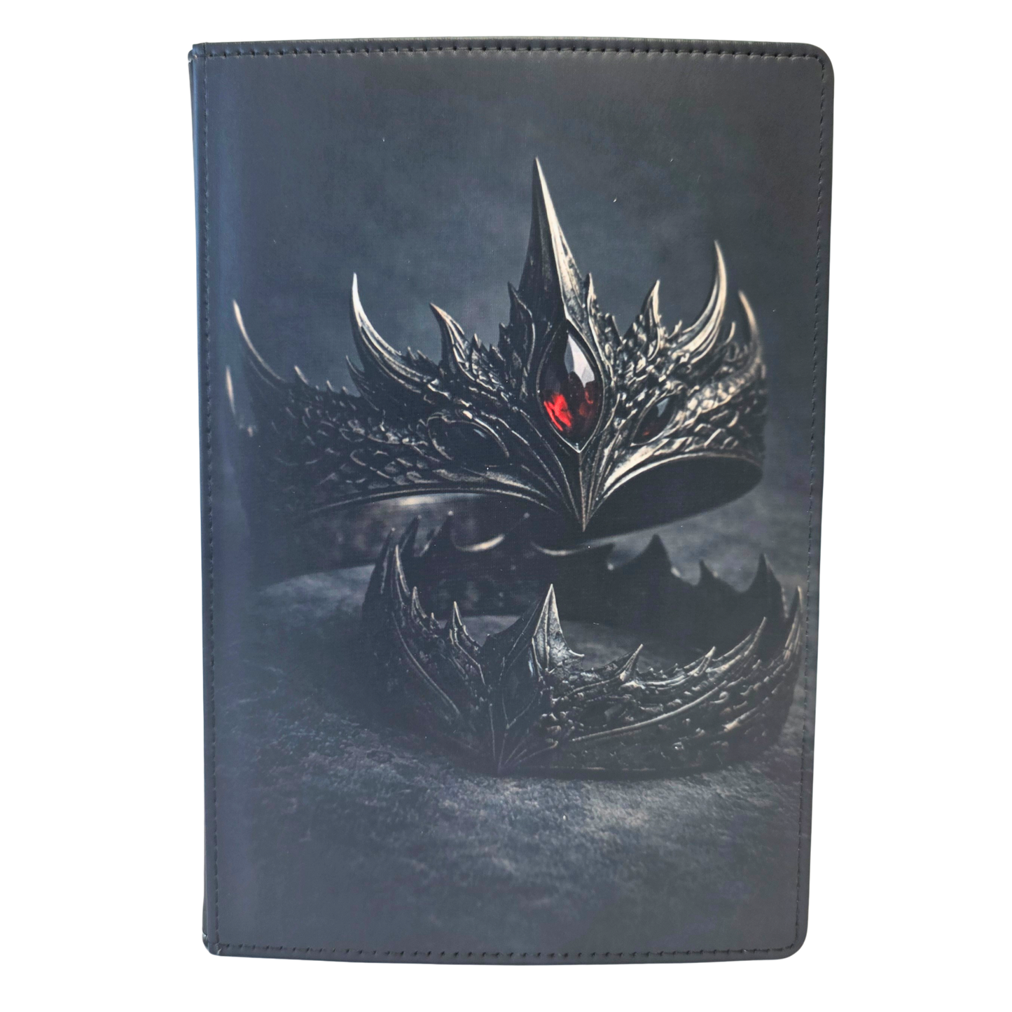 Journal cover featuring iron crowns with dragon scales and a red jewel. Gray background.