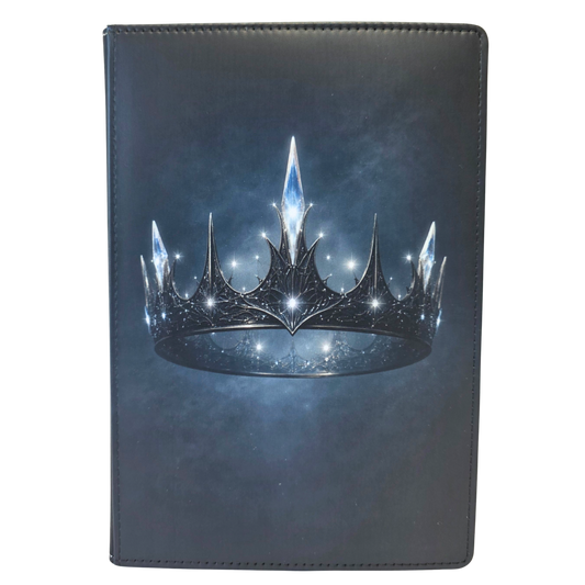 Journal cover with a floating metal crown donned with crystals.