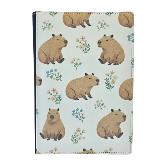 Notebook cover with capybara pattern on a light cream background