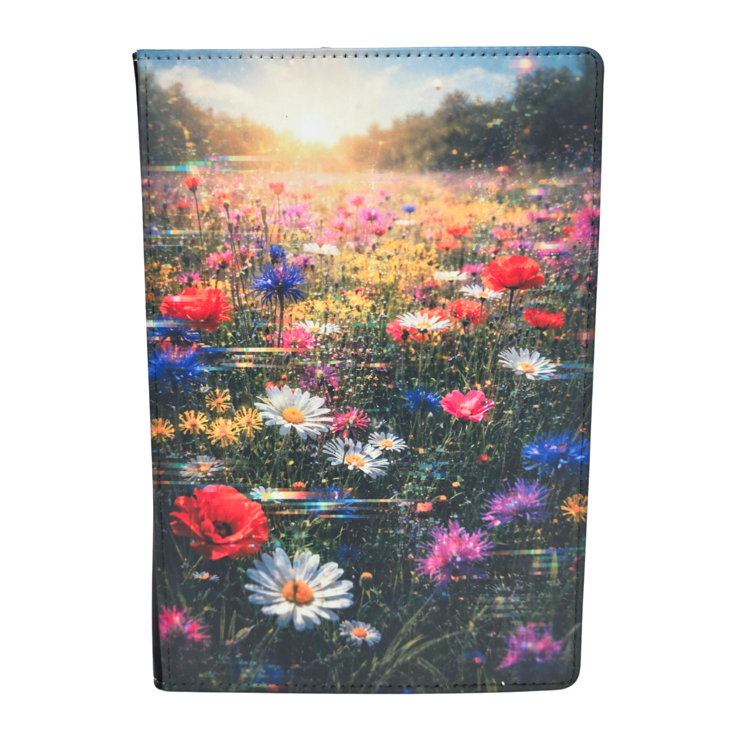 Faux leather journal cover with a field of flowers design on a white background