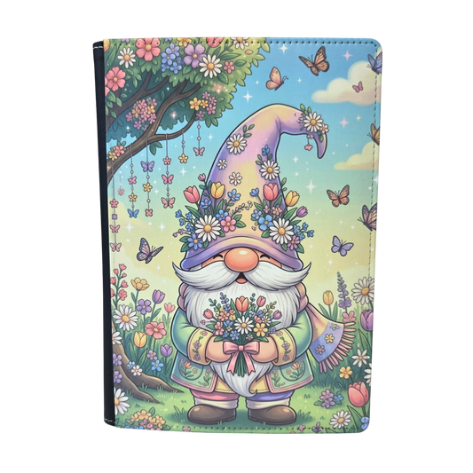 A journal cover with a colorful gnome standing under a tree.